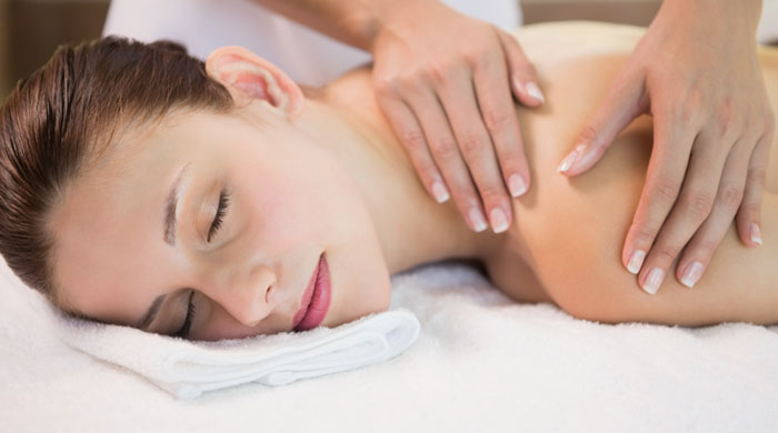 Woman receiving shoulder massage